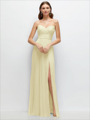 Cream strapless pleated chiffon maxi dress with ruched sweetheart bodice and side slit