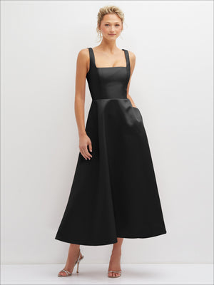 Square-neck satin midi dress in black with thin straps, fitted bodice, and full skirt