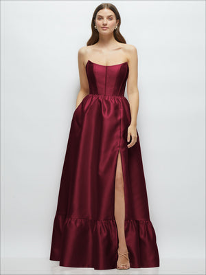 Strapless satin maxi dress with corset bodice, side slit, and ruffle hem, deep burgundy
