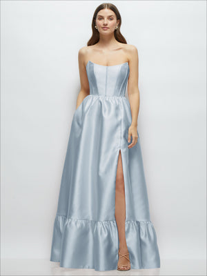 Light blue strapless maxi dress with boned bodice, tiered ruffle hem and side slit