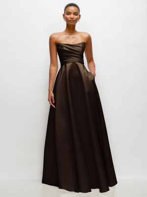 Dark brown strapless satin maxi dress with draped bodice and full gathered skirt.