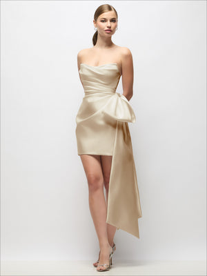 Strapless satin mini dress in ivory with pleated drape and long tail bow detail