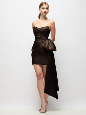 Chocolate brown strapless satin mini dress with draped pleats and long bow tail