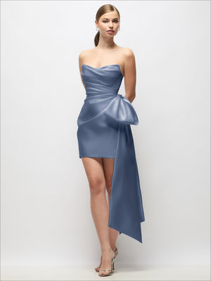 Blue strapless pleated satin mini dress with draped bow tail and covered buttons