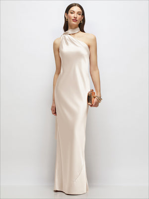 One-shoulder satin maxi dress in champagne with draped scarf neckline and bias skirt.