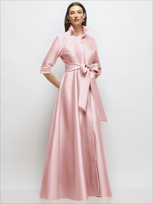Pink satin shirt dress with bow sash tied at waist, 3/4 sleeves, jeweled buttons