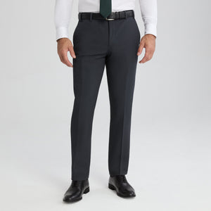 Charcoal gray men’s suit pants with belt loops and center crease, slim fit