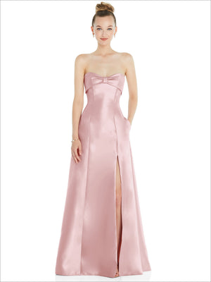 Blush pink satin strapless ball gown with bow at bust and front slit