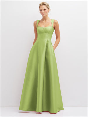 Light green satin bustier dress with spaghetti straps and full gathered skirt