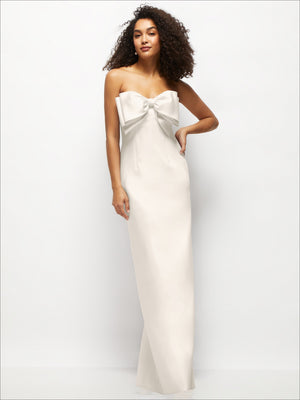 White strapless satin column maxi dress with oversized bow at neckline