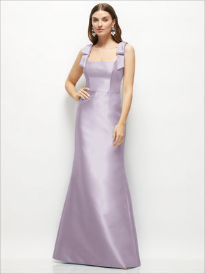 Lilac satin fit-and-flare maxi dress with shoulder bows and square neckline.