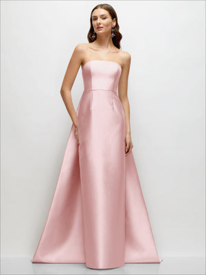 Soft pink strapless satin column dress with fitted bodice, floor-length silhouette, back train