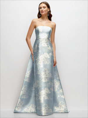 Light blue floral strapless satin column dress with fitted waist and full skirt.