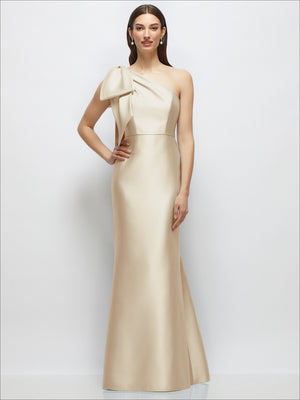 One-shoulder satin maxi dress in champagne ivory with bow-shoulder detail and trumpet skirt