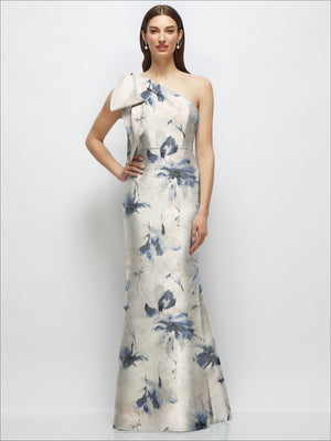 Ivory satin one-shoulder maxi dress with blue floral print and draped bow detail