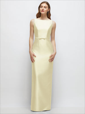 Light yellow satin column dress with bateau neckline and bow-trimmed skinny belt.