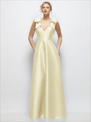 Cream satin ball gown with deep V-neck and shoulder bow details, structured full skirt