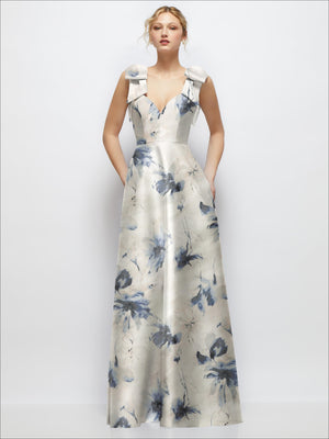 Cream satin ball gown with blue floral print, deep V-neck and shoulder bows