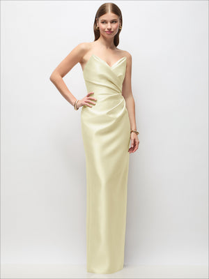 Strapless draped satin column maxi dress in pale yellow with cowl neckline and side slit.