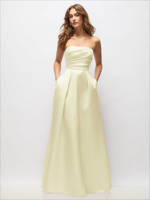 Light yellow strapless satin maxi dress with fitted bodice and full pleated skirt