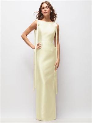 Light yellow satin column maxi dress with V-neckline and long tail bow strap details, front view