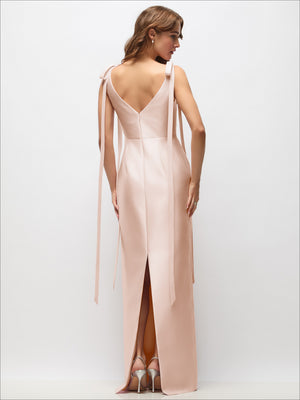 Blush satin column maxi dress with V-neck back and long bow-tail straps
