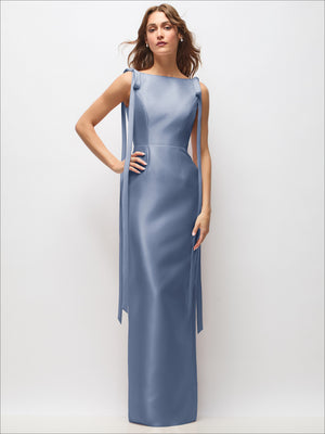 Light blue satin column maxi dress with bateau neckline and exaggerated tail bow strap ties