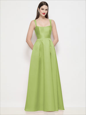 Green satin maxi dress with square neckline, thin straps, basque waist, pleated skirt