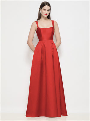 Red satin maxi dress with square neckline, thin straps, basque waist, pleated skirt
