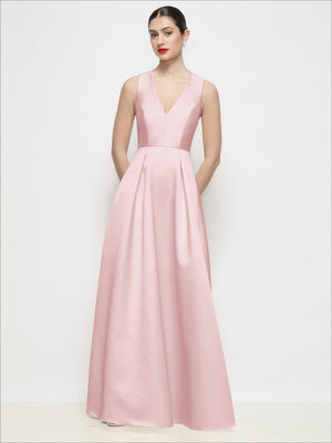 Blush satin maxi dress front view with deep V-neck, sleeveless style and pleated skirt