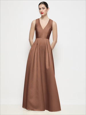 Cognac-brown sleeveless V-neck satin maxi dress with pleated skirt and gathered waist