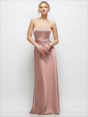 Strapless A-line stretch satin maxi dress in ballet pink with fitted strapless bodice.