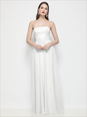 Strapless chiffon maxi dress in white with fitted bodice and flowing circle skirt, front view