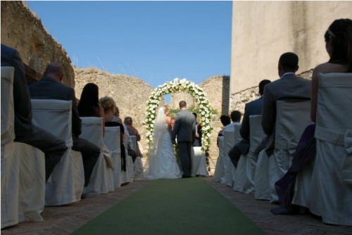 arch of flowers at wedding bridal bower of roses
