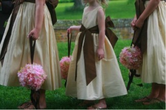 bridesmaids with pink silk hydrangea pompoms bridesmaids with pink silk hydrangea pompoms