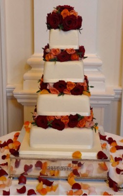 tiered wedding cake by cake tiered wedding cake decorated with red and orange roses