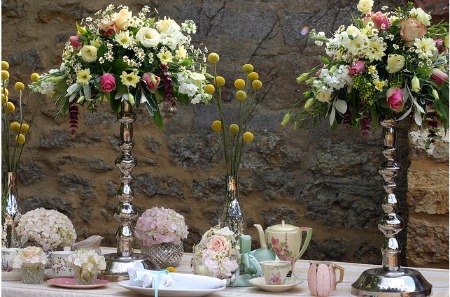 Wedding table with tall floral candelabra tall candelabra with floral decorations