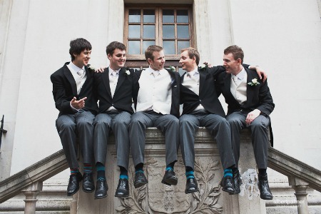 groomsmen in Dessy waistcoats bridegroom and best men after wedding