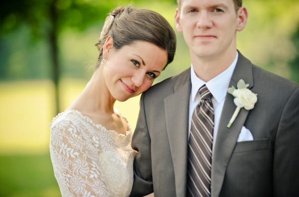 Bride and groom Bride in lace wedding dress with bridegroom