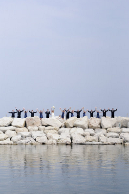 wedding guests by sea wedding guests standing by lake