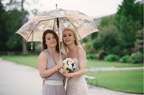Bride and bridesmaid in pastel dresses
