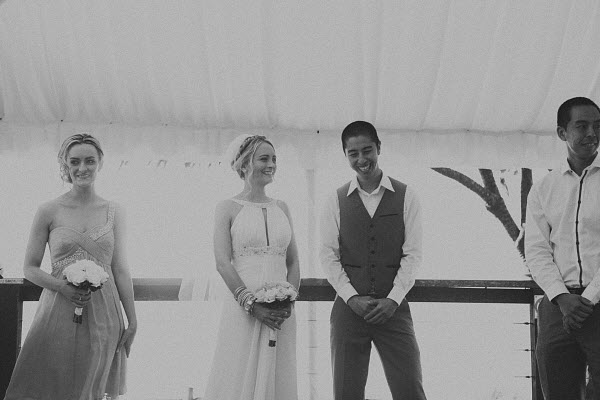 pink wedding ideas bride and groom saying vows