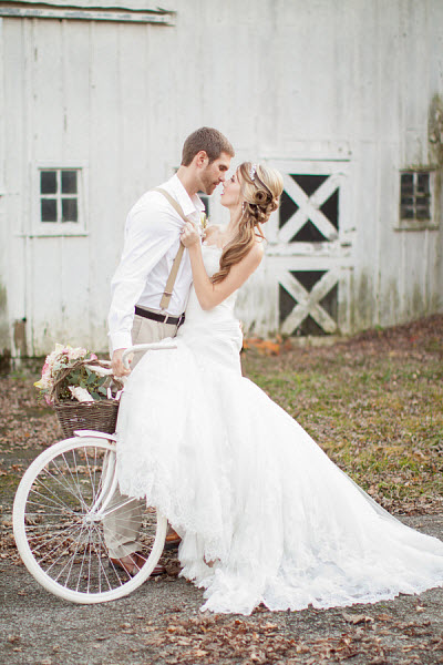 summer wedding ideas bride and groom on bike
