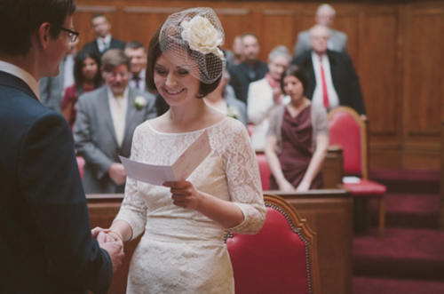 bride in register office in 1960s style wedding dress