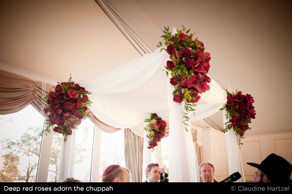 Claudine Hertzel Jewish wedding chuppah with red roses
