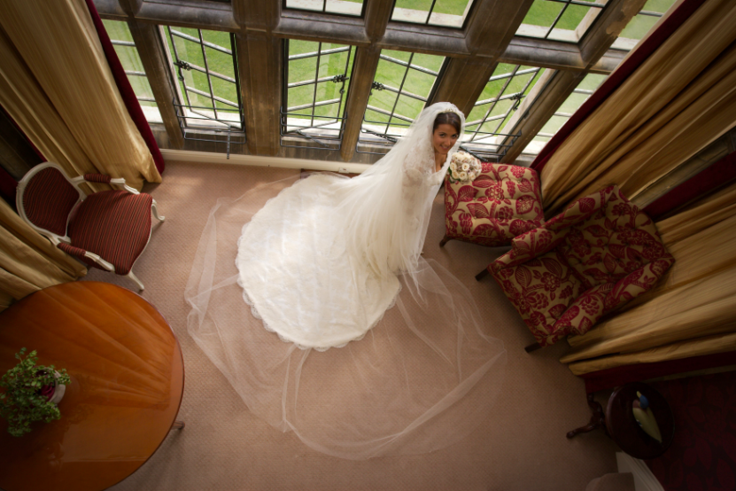 bride standing by window