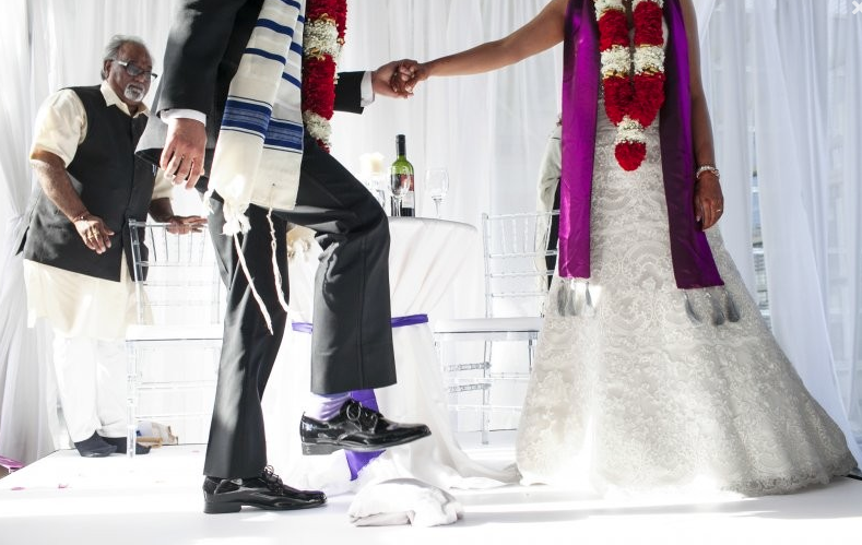 Jewish bridegroom smashing glass