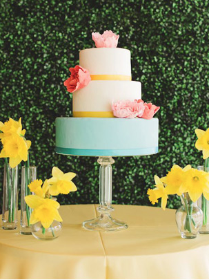 Orange teal and yellow wedding cake