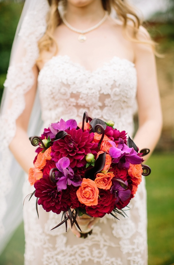 Bride's bouquet by Tucker Images Plum coloured bridesmaid dresses